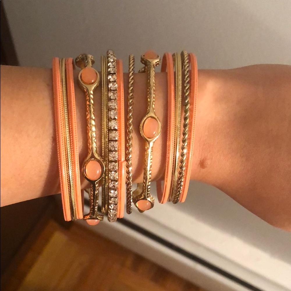 Gold and coral bangles